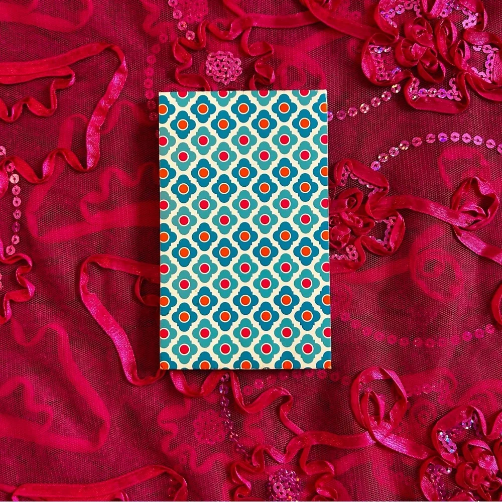 turquoise and orange unlined notepad